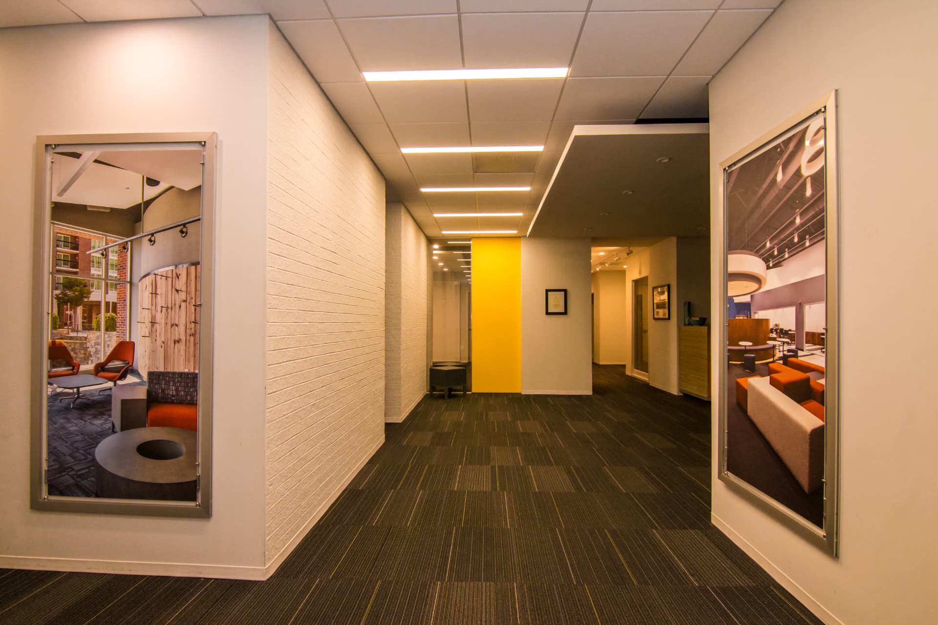 Office corridor with framed prints