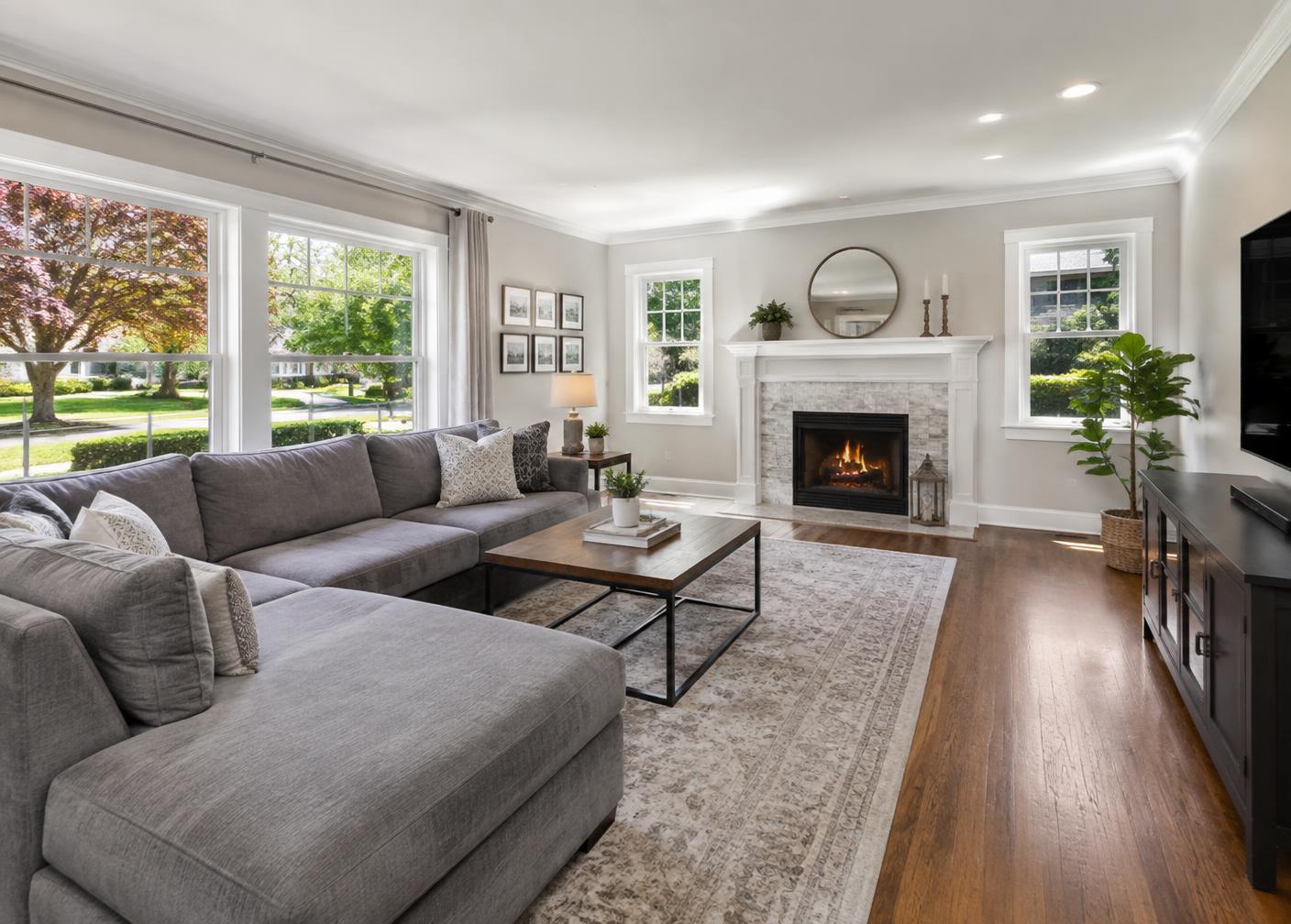 Living room with fireplace and natural light