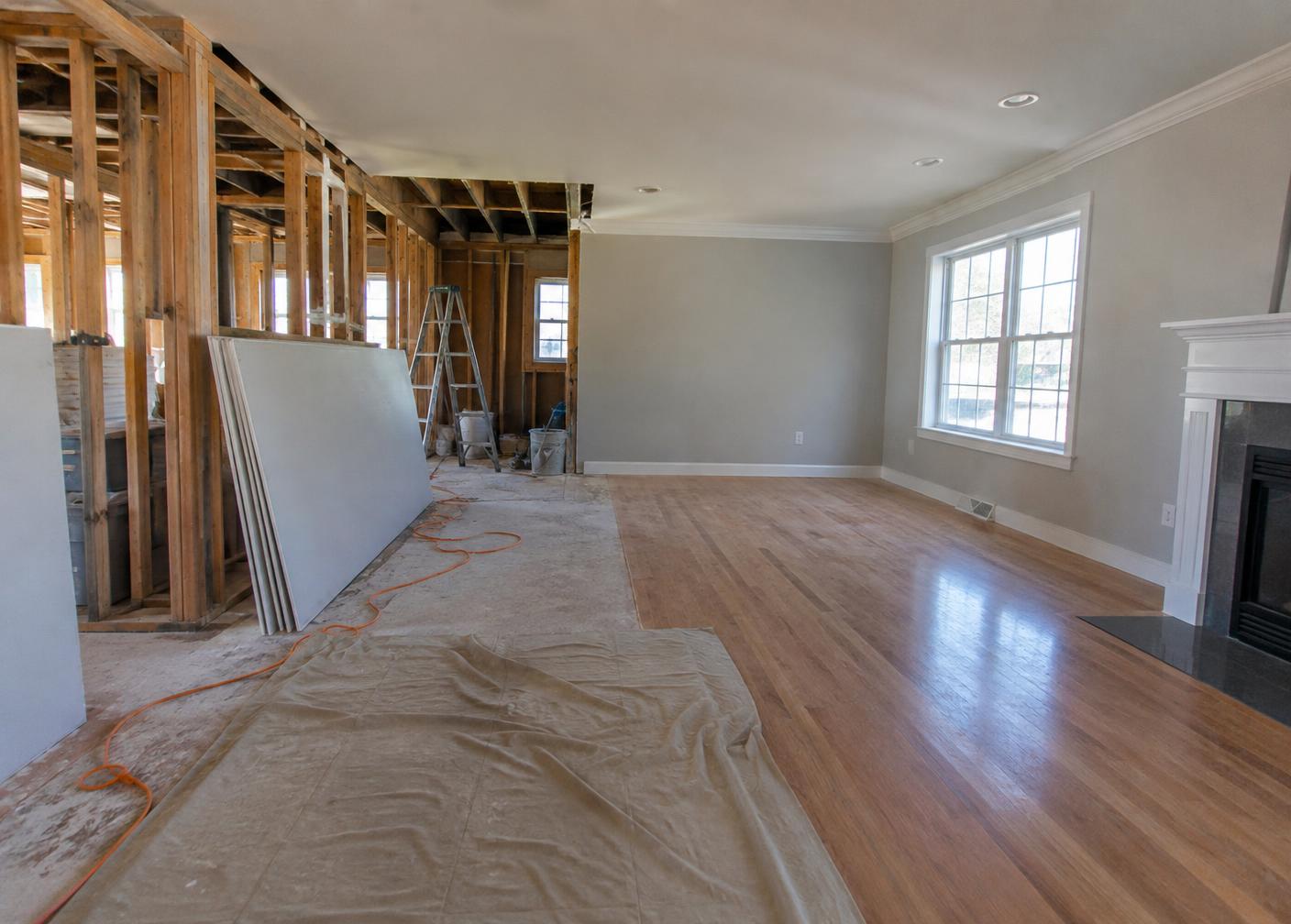 Construction project shown during framing and after completion